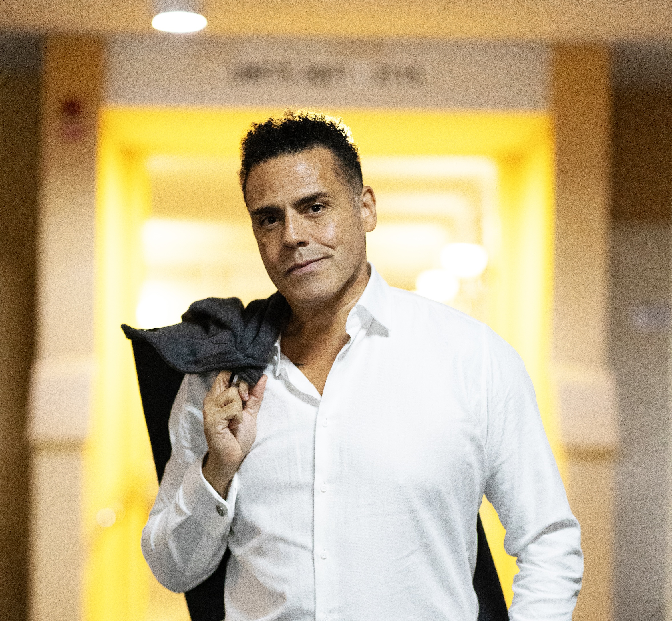 Jonathan MacDonald speaking on stage